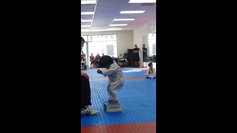 3 year old tries to break board in taekwondo