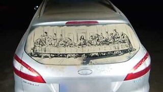 Artist creates "The Last Supper" on dirty car