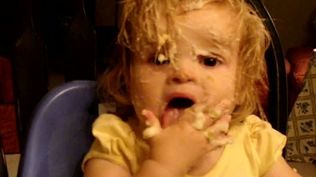 "Little Girl Rubs Mashed Potato Into Face and Hair"