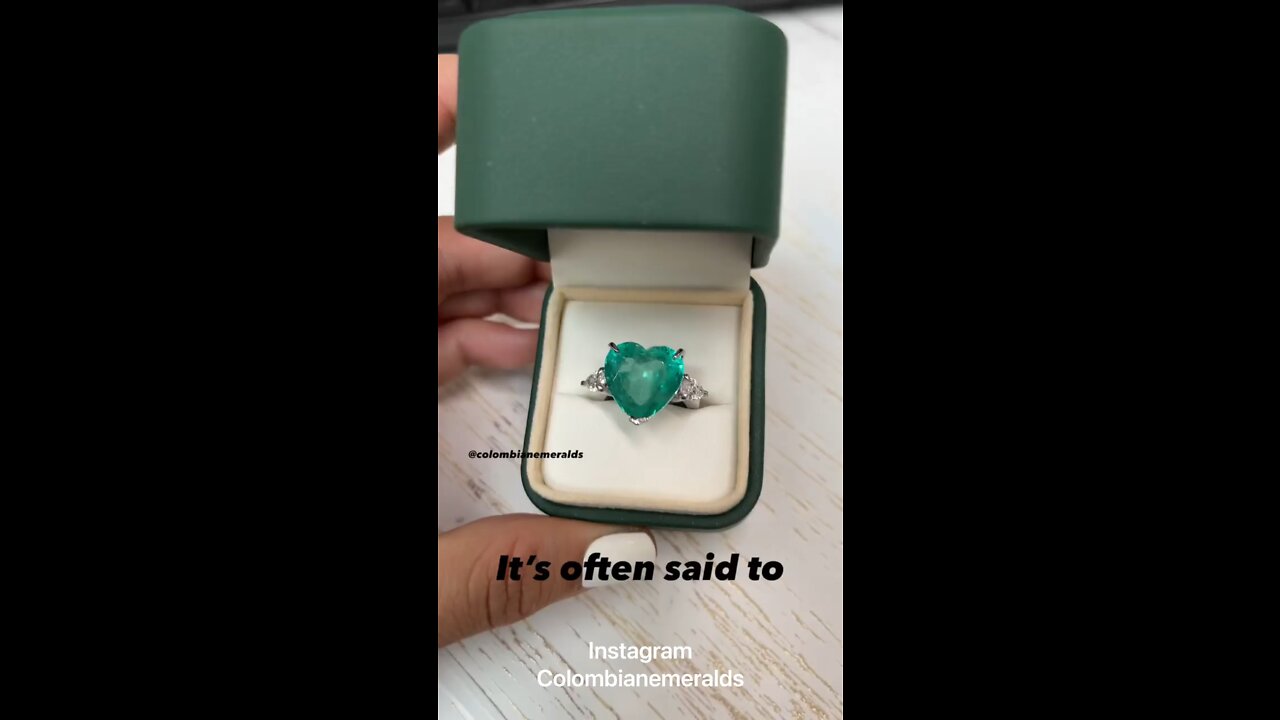 Huge 12 Carat top quality heart Colombian emerald and diamond pear ring in 18K white gold