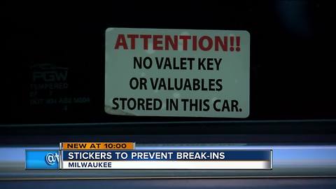 Local auto shop provides prevention stickers after rash of broken windows