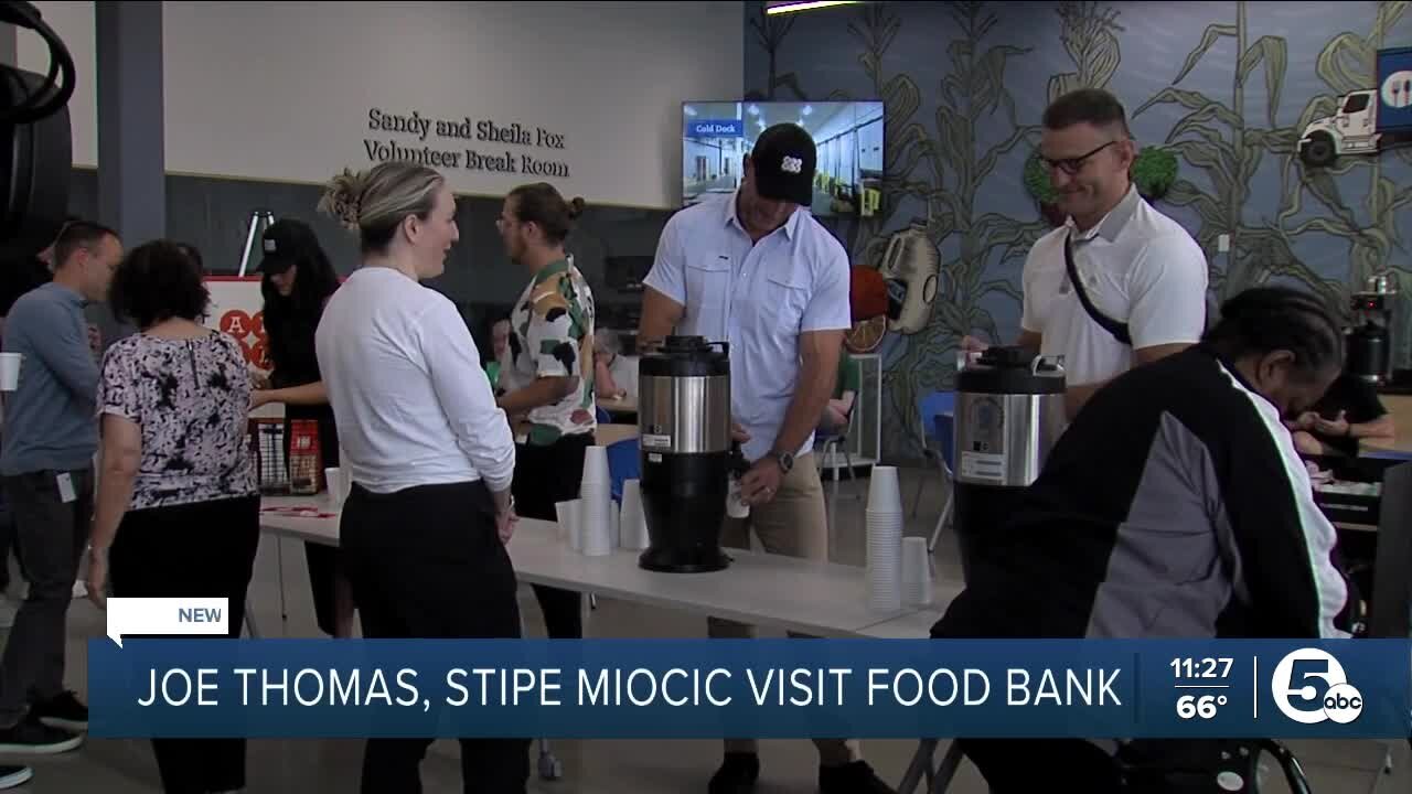 Joe Thomas, Stipe Miocic serve coffee to staff at Greater Cleveland Food Bank