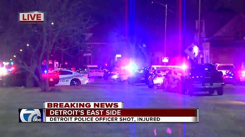 Police on scene of barricaded suspect after police officer wounded on Detroit's east side