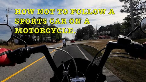 How not to follow a sports car on motorcycle