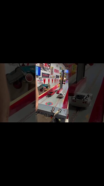 Slot car drags: Ranchero Vs. C7 Corvette 1/8 mile.