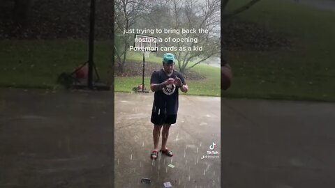 Opening Pokémon cards in the pouring rain 🌧️☔️