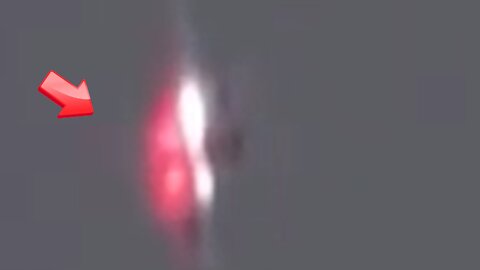 The red light near the building is either a UFO or a drone
