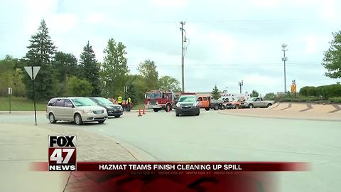 UPDATE: Hydraulic oil spill closes down road
