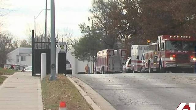Firefighters work to rescue trapped worker