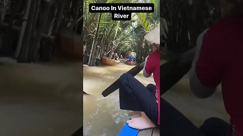 Canoe In Vietnamese River