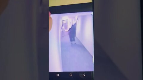 Big Bafoon shoves little lady in hall