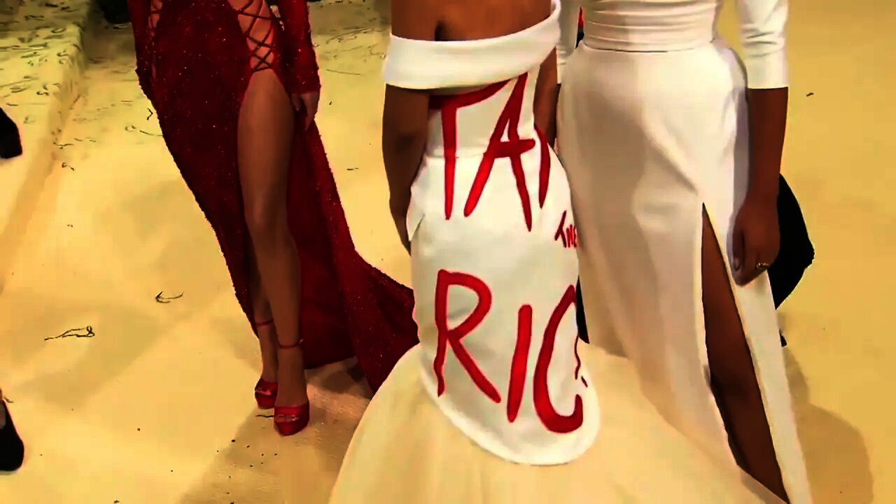 Alexandria Ocasio-Cortez Wears ‘Tax the Rich’ Dress at Met Gala 2021