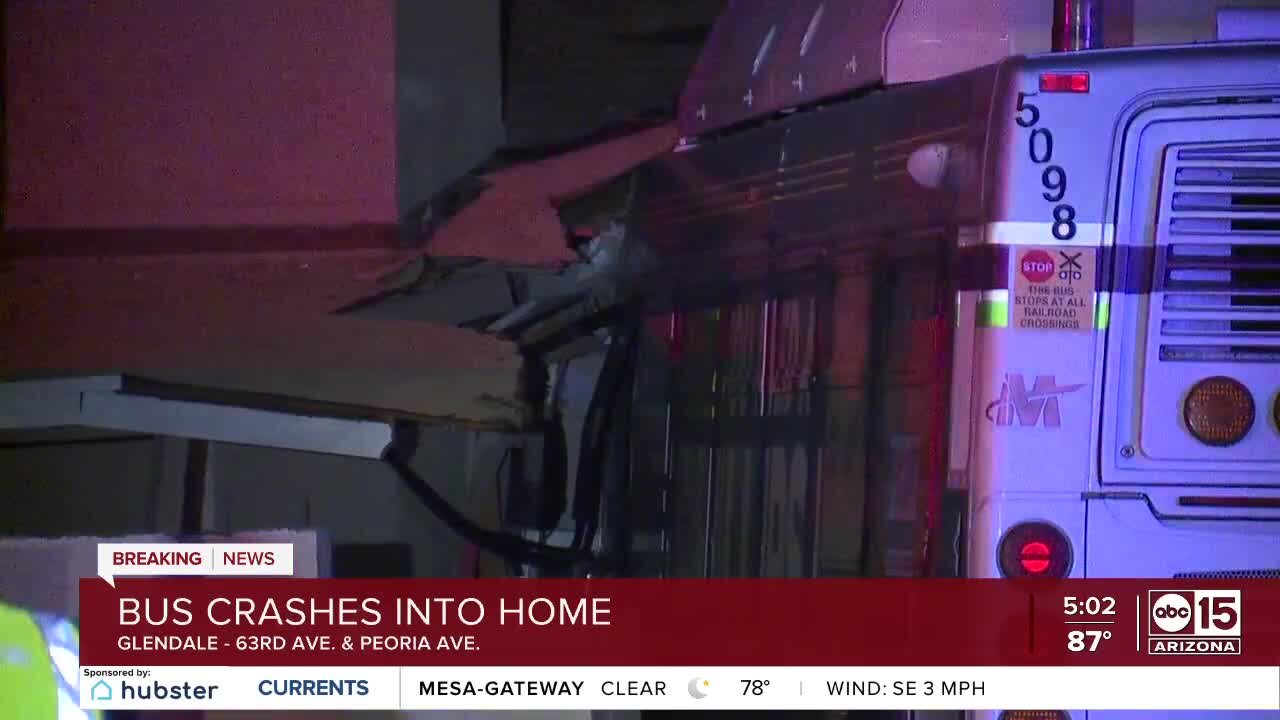 Bus crashes into home near 67th and Peoria avenues