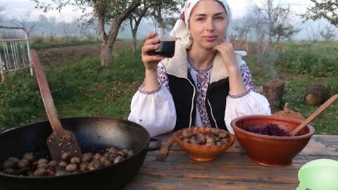 Women Lives in the village. Cooking Potatoes with Bacon on fire. Making special drink.