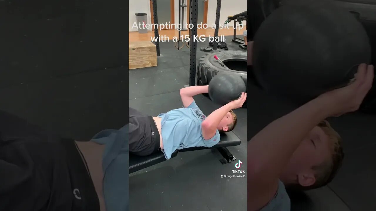 Attempting to do a sit up with a 15 KG ball #gym