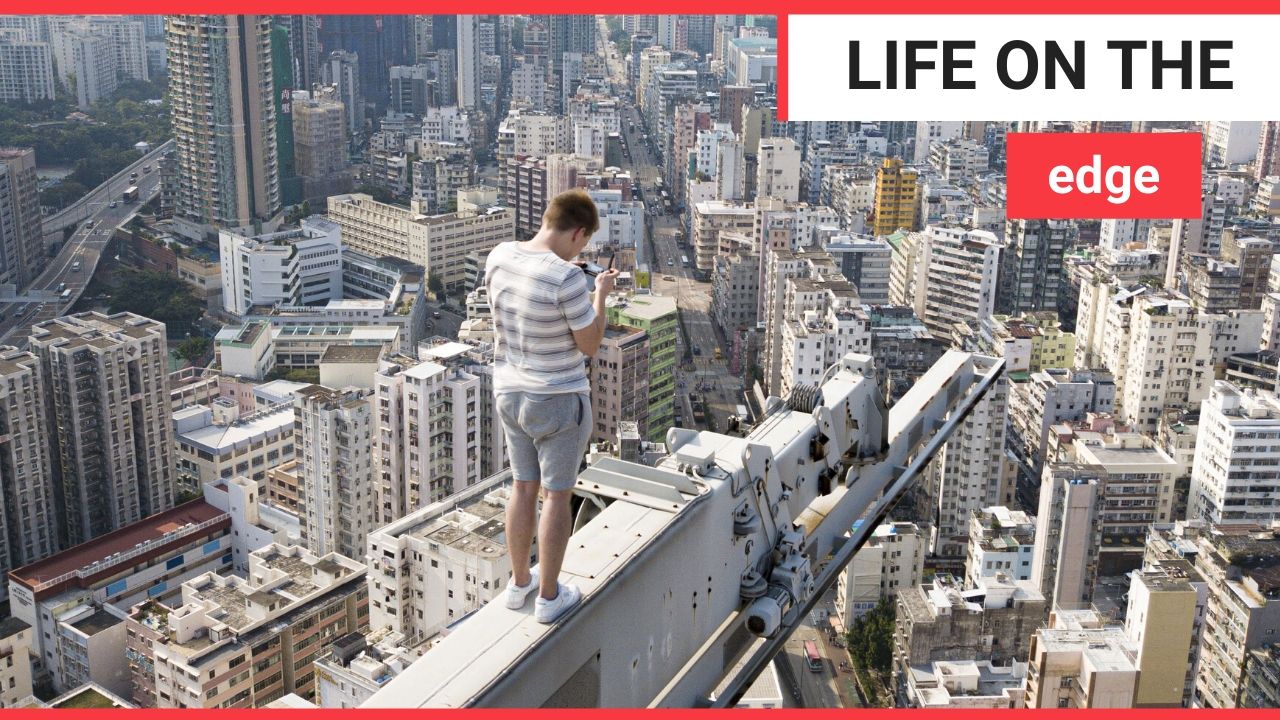 Dizzying birds-eye view of the skyline of Hong Kong taken by one daredevil drone-pilot