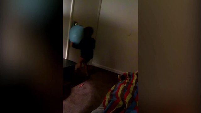 A Tot Boy Runs Into An Bouncing Ball Over And Over Again