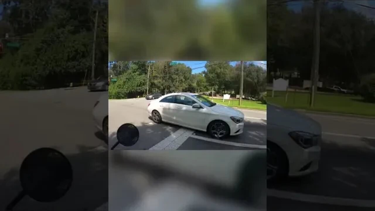 multiple cars almost hit biker, is he a ghost????