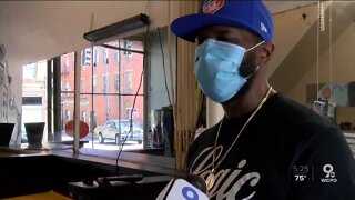Main Street businesses in Over-the-Rhine clean up, prepare and show support for protesters