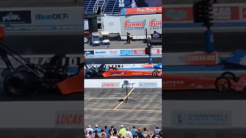 Top fuel dragsters heating up the slicks