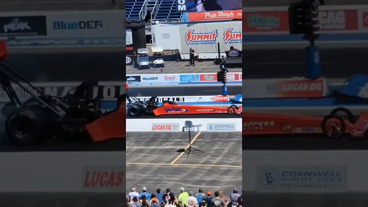 Top fuel dragsters heating up the slicks