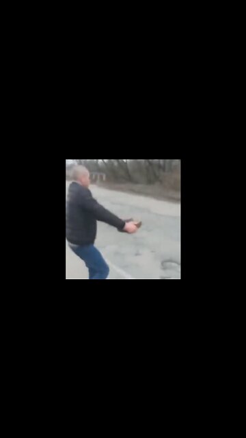 Ukrainian Man Removes Mine From Roadway While Smoking Cigarette