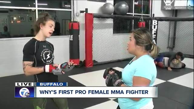 Thuy Lan gets taken down by WNY's first pro female MMA fighter