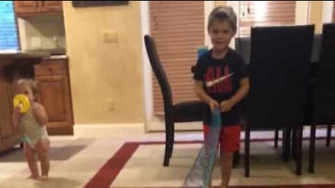 Dad hits son with slinky