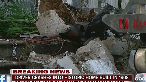 Driver crashes into historic home built in 1908