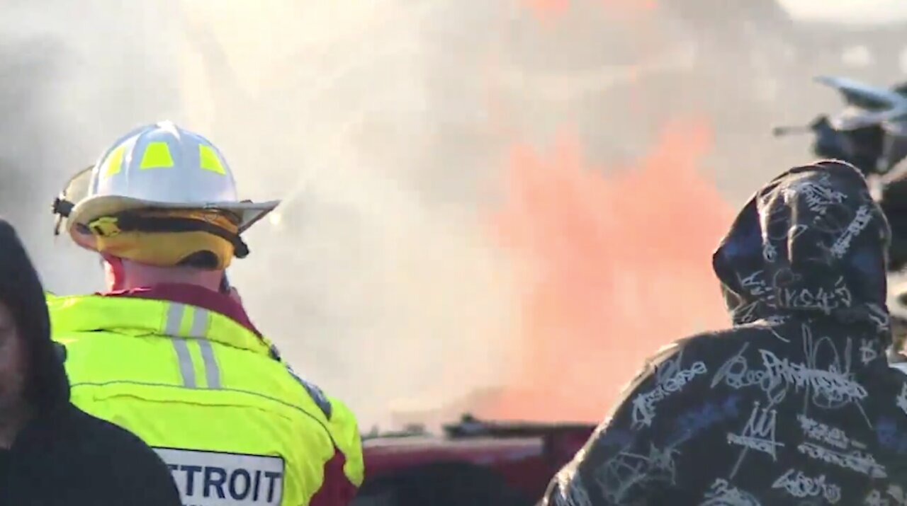 Nearly 200 cars catch fire at Detroit junkyard