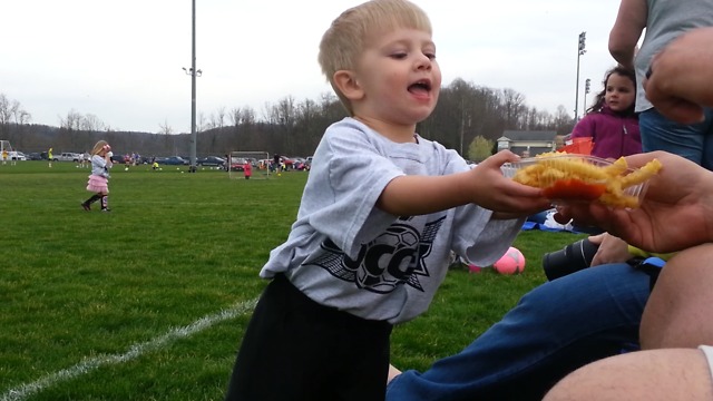 Kid Stops Playing Soccer To Eat French Fries