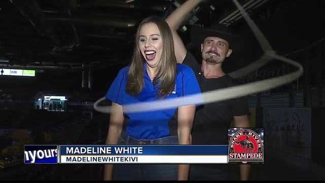 Man with fiery rope act performs at rodeo