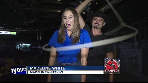 Man with fiery rope act performs at rodeo