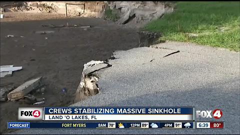 Crews look at stability of Florida sinkhole that ate 2 homes