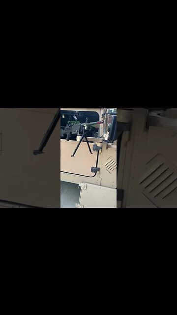 Half doors and M249 installed on the HMMWV