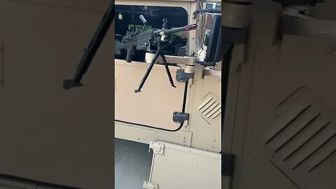 Half doors and M249 installed on the HMMWV