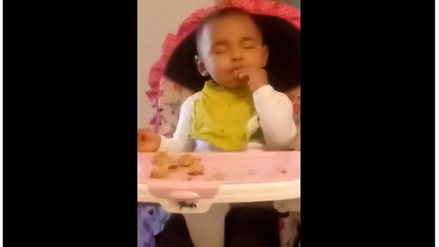 Tired Baby Practically Falls Asleep While Eating Her Favorite Snack