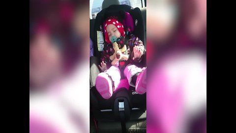 Sleeping Baby Just HAS to Groove to her Favorite Song