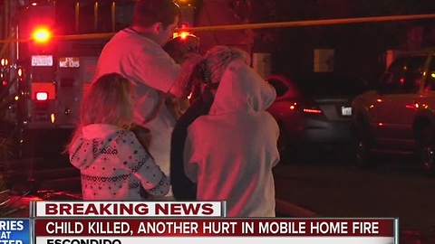Child killed, another hurt in mobile home fire