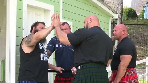 World's Strongest Men in a Tug o' War Challenge at Braemar Gathering Highland Games site in Scotland