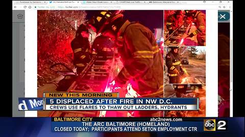 D.C. fire crews use flares to thaw out ladders, hydrants at fire scene