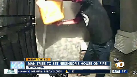 Man caught on camera trying to set neighbor's home on fire