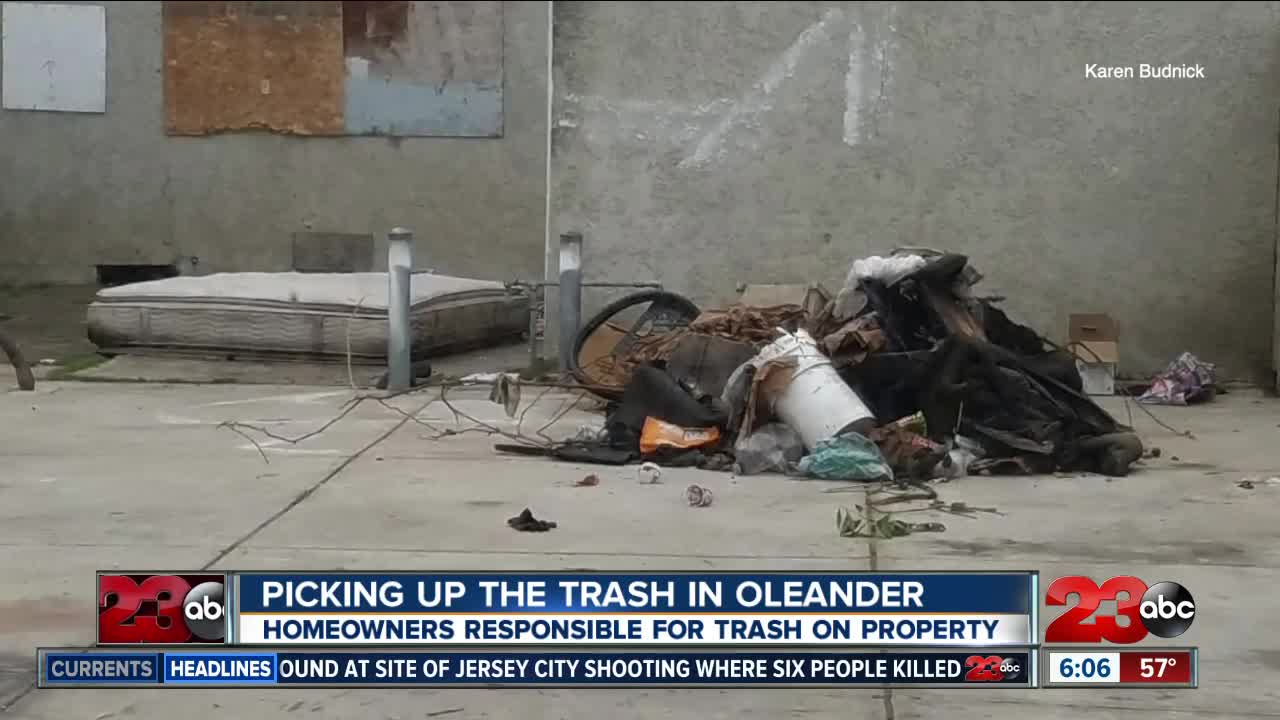 picking up the trash in Oleander