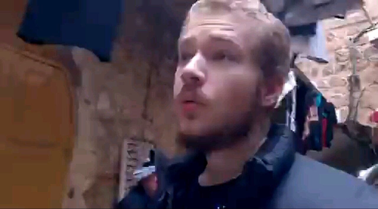 The officer who was guarding the settlement asked him “Are you Muslim?” before letting him in.