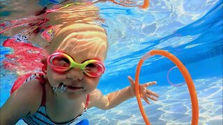 Baby Underwater with Dive Rings