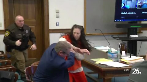 WATCH: Murder defendant attacks her own attorney