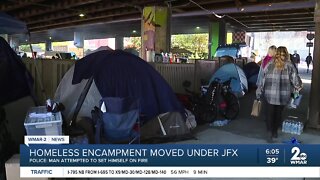 Residents of tent city clash with city officials