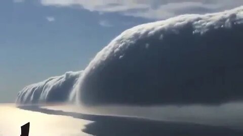 A beautiful roll cloud over Lake Michigan immortalized by Ken Temple