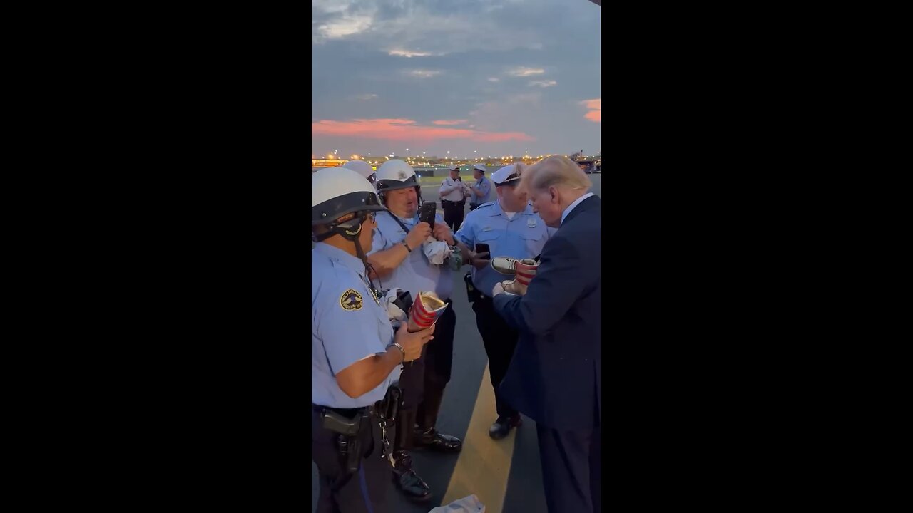 WATCH: Trump autographs his gold sneakers for Philadelphia law enforcement officers