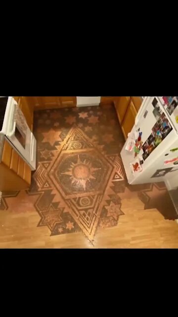 Hundreds of thousands of pennies used to create floor art